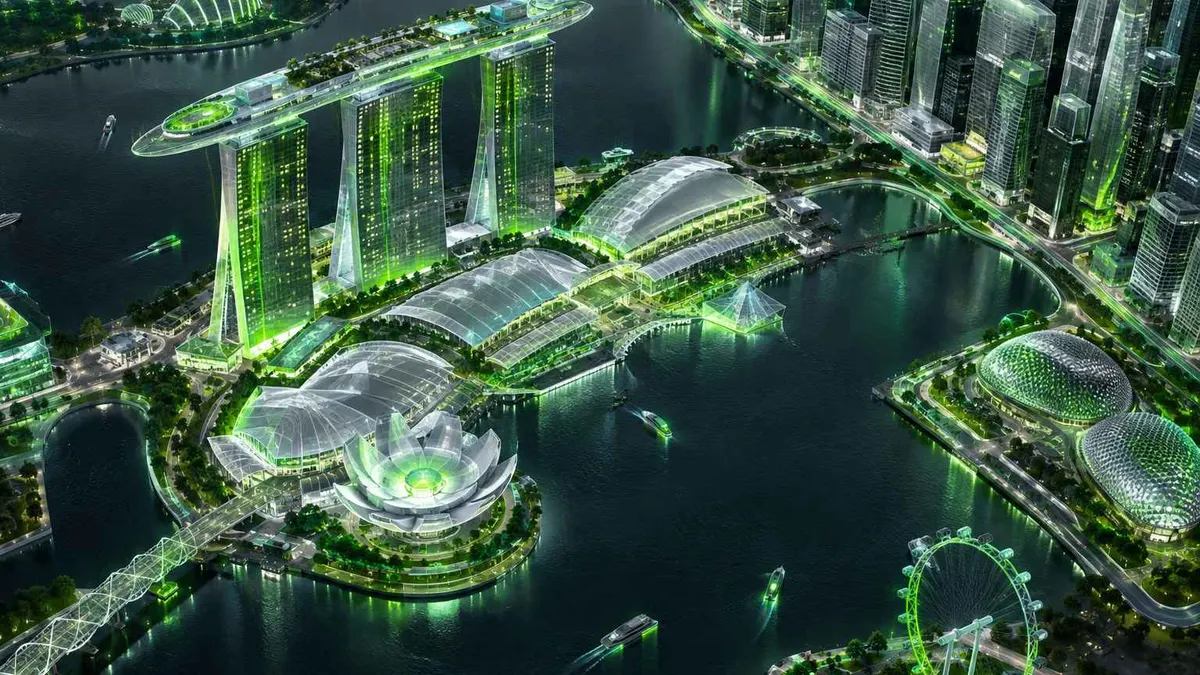 Kawasan Marina Bay Singapura dari atas dengan atap taman dan gedung kaca bercahaya hijau